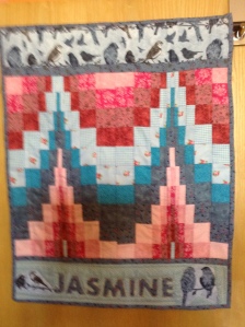 Front of the quilt with baby's name