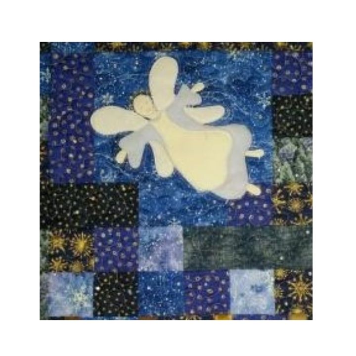 An angel flying over rooftops. Patchwork textile